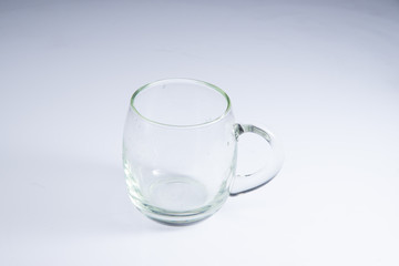 transparent mug on white acrylic sheet