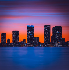 Fototapeta na wymiar city skyline colors night cityscape skyscraper architecture aquatic downtown miami florida usa sky buildings sunset panorama prints beautiful