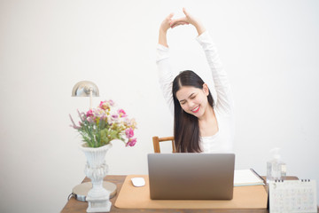 Beautiful woman is working from home