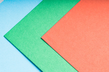 Fototapeta premium multi-colored sheets of paper , abstract background, tinted image, selective focus