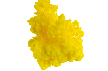 Blurred and focus yellow poster color dissolving in water for abstract and backgorund concept.