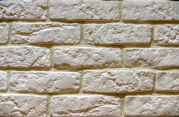 background of dark white brick laid horizontally