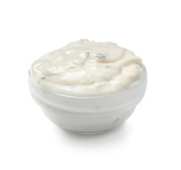 Bowl with tasty sauce on white background