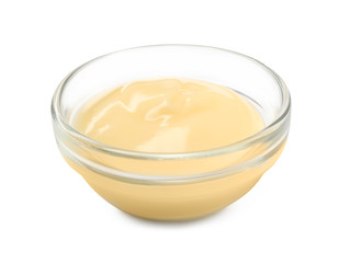 Bowl with tasty sauce on white background