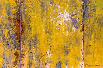 Texture painted rusted metal, colored background with iron fence. grunge green-yellow old dirty...