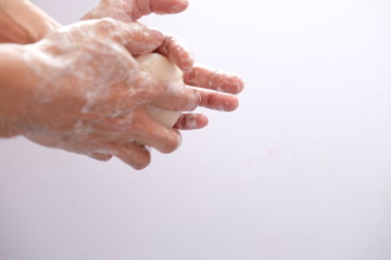 washing your hands on white background and washing every time for coronavirus protection