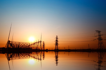 Fototapeta na wymiar Wire electrical energy at sunset