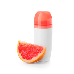 Deodorant and grapefruit on white background