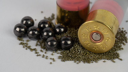 12 gauge shotgun ammunition on a white background