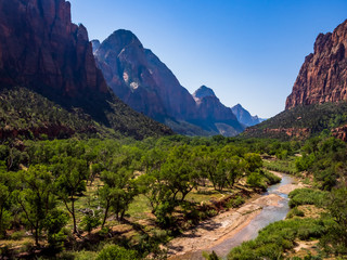 Southwest usa Zion National Park The main part of the park is Zion Canyon surrounded by the walls of the Deertrap, Cathedral and Majestic Mountain mountains. The Virgin River flows through the canyon.
