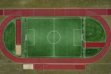 Field for training. Field for various sports. Running track. The view from the top. Drone shot