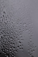 drops on glass after rain, closeup 