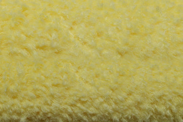 yellow fabric texture, close-up sponge