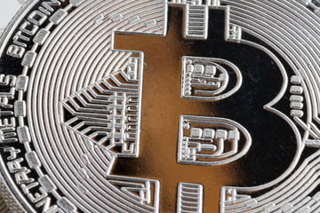 Fototapeta na wymiar Shiny closeup crypto-currency coin background. Electronic money, cryptocurrency.