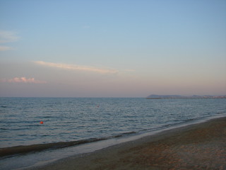 Natural picture of the unbelievable colors of the sunset in the cloudy blue evening sky over the Adriatic Sea.