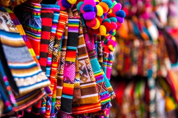 Fotobehang Closeup of light striped handbags on the souvenir store in Bolivia © tan4ikk