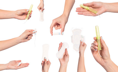 set of  female  hands  holding care objects  -  pads and tampon sisolated on white background - Image