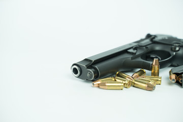 Black gun and ammunition on white background. Baretta 92