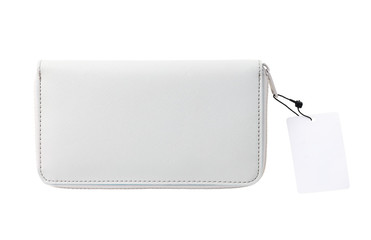 Women's wallet with a white label. Stylish wallet made of artificial light material isolated on a white background.