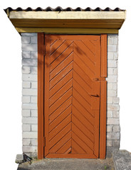 Orange  painted wooden broken  door in the small rural no name  stone shed isolated