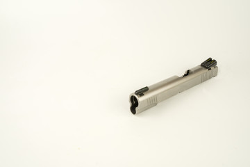 Parts  of a .45 ACP hand gun, Model 1911. 11 mm gun.