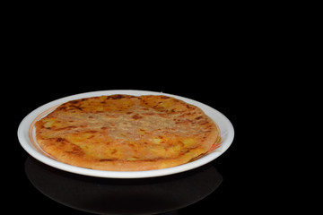Aloo parantha in plate with black background front view