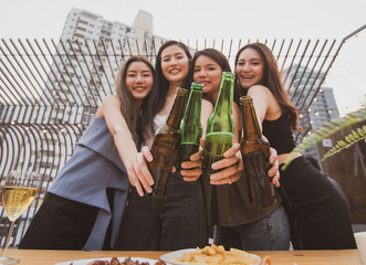young asian woman happy  party drink beer.