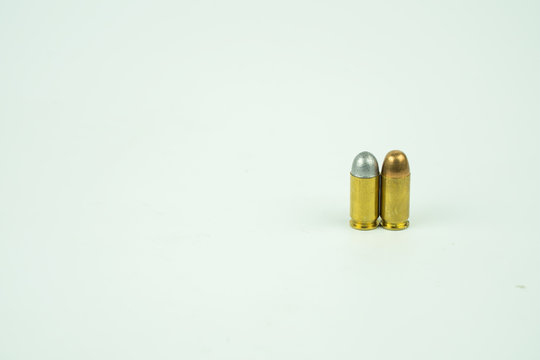 .45 Acp Bullet On White Background.