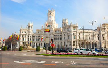 Fototapeta na wymiar Madrid, Spain, Cibeles Palace. The Cibeles Palace is an architectural masterpiece of Madrid. On the most beautiful square in Madrid – Plaza de Cibeles-stands a snow-white Palace. It was built in 1918