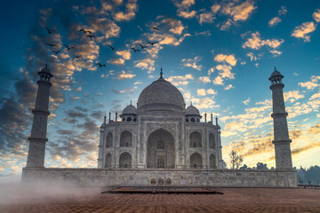 Fototapeta na wymiar Taj Mahal is an ivory white marble mausoleum on Yamuna river in the Indian city, Taj Mahal is most beautiful monuments in India and one of the wonders of the world, Agra, Uttar Pradesh, India.