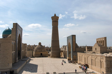 Great Minaret of the Kalon (symbol of the city), Kalon mosque and Mir-i-Arab Madrasah. Bukhara,...