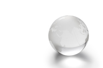 Transparent glass globe on white background