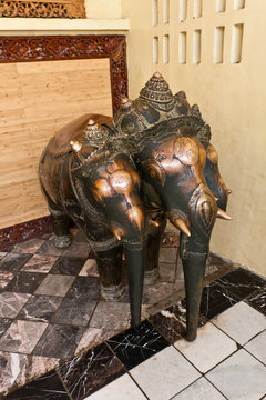 The hand-polished metal statues of a lucky three-head elephants outside the Mahamuni Buddha Temple, Mandalay