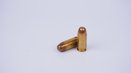 Ammunition of the handgun. bullet .45 acp. on a white background
