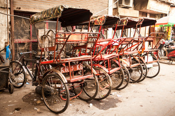 Old rickshaws in the parking streets of New Delhi India