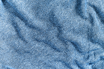 Texture of knitted fabric background. Close up clothing classic blue color trend 2020.