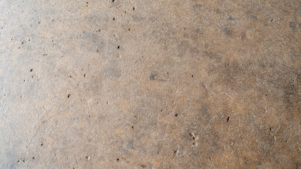 The surface of the old cement walkway flooring