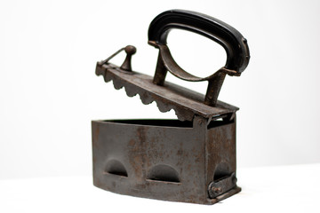 Antique coal iron isolated on white background