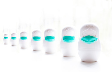 Covid-19- group of white figures with mask