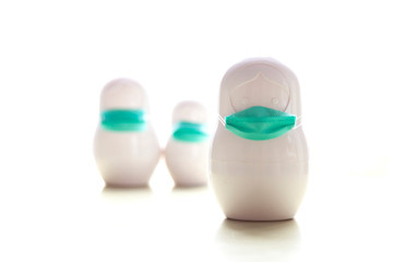 Covid-19- group of white figures with mask