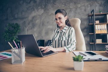 Portrait of positive cheerful freelancer lawyer girl sit desk work laptop write online message...