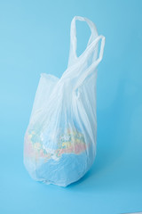 planet Earth in polyethylene plastic disposable bag.World Environment Day concept. Earth Day. copy space.