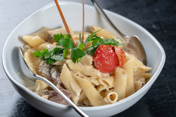 pasta next to it wine