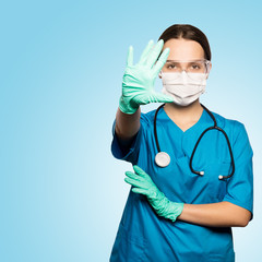 Doctor Surgeon woman in mask with stethoscope.