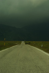 Panoramic road on the Campo Imperatore plateau, in the distance the arrival of a storm. Gran Sasso...