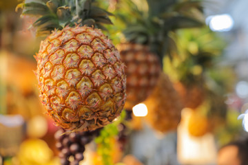 Ripe whole pineapple at market.