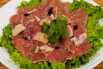 Beef carpaccio with parmesan cheese