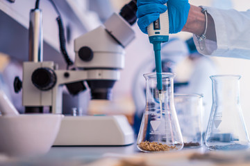 Medicine, pharmacy and cosmetology concept in laboratory scientist working on research 