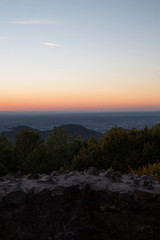 Skyline over the Rhine into a German low mountain range at sunset