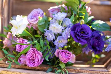 Bouquets of fresh flowers decoration of the festive table. Celebrating an open air party. Decor Details